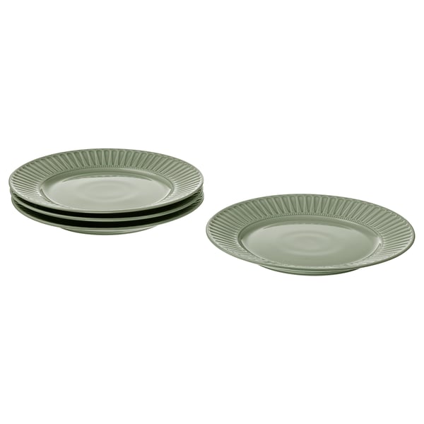 A set of green striped plates, ideal for dining, with a sleek design and crafted feel.