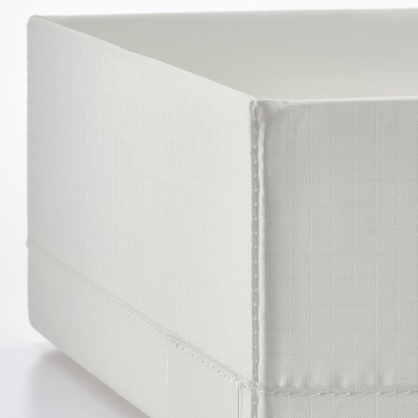 Closed white fabric storage box, neatly stitched, showcasing quality craftsmanship.