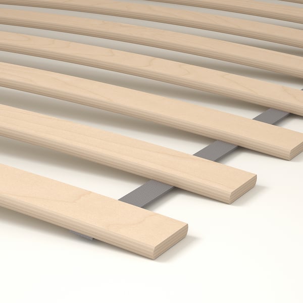Close-up of wooden slats, neatly arranged, showing smooth finish and sturdy construction for TARVA bed frame.