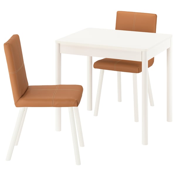 Small white dining set with brown cushioned chairs. Modern design, clean lines.