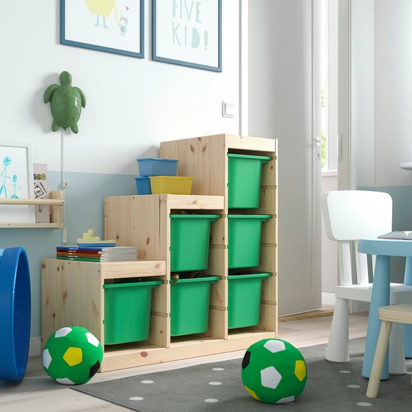 TROFAST storage unit with green boxes, brown frame. Large, kid-friendly, stackable design.