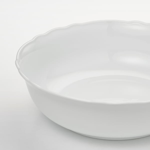 Large, pristine white porcelain bowl, smooth edges, durable design.