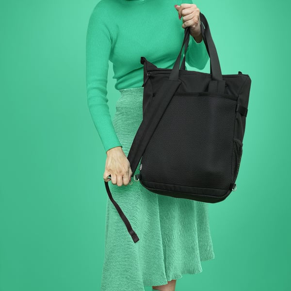 Black VÄRLDENS backpack with multiple compartments and removable bag.