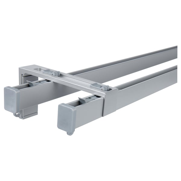 A silver VIDGA double curtain rod system. It includes two horizontal rails and supporting brackets, designed to hold multiple curtain layers.