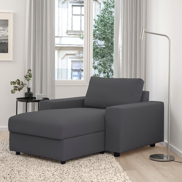 Modern grey l-shaped VIMLE sofa by window, fits well in bright room.