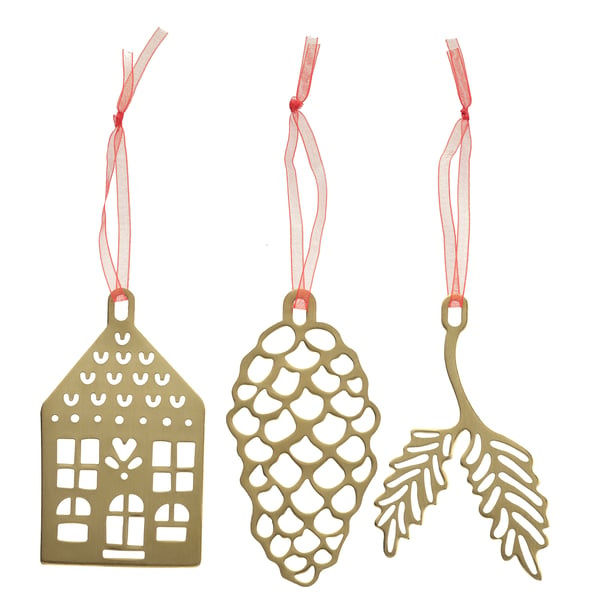 Three golden hanging decorations: house, pinecone, and leaves. Red ribbons attached.