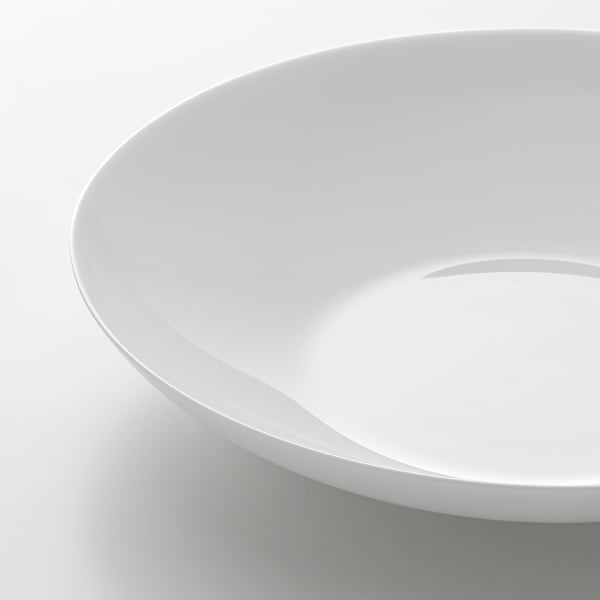 Clean, minimalistic white bowl. Smooth, rounded edges. High-quality, glossy finish.