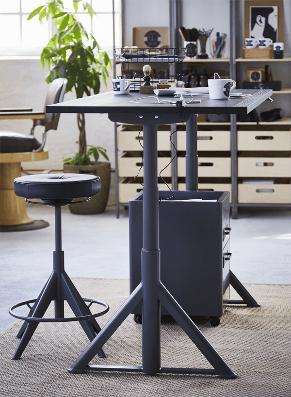A Glose black TROLLBERGET active sit/stand support in the home office