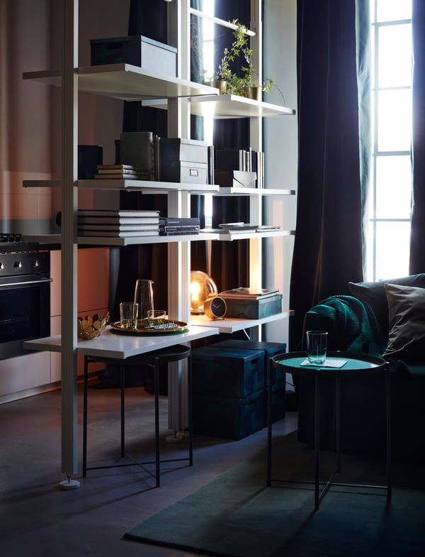 A dark green GLADOM tray table in the living room