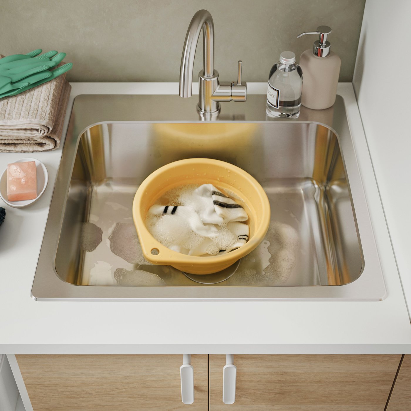 A foldable/yellow PEPPRIG wash-tub