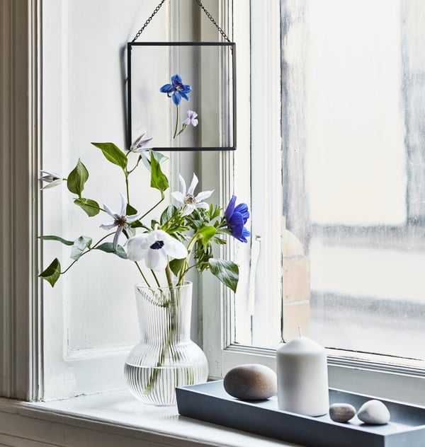 IKEA PÅDRAG clear vase on a window ledge.