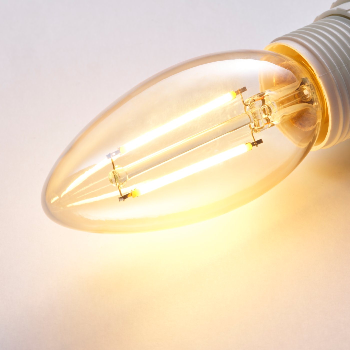 A dimmable/chandelier brown clear glass LUNNOM LED bulb E14 210 lumen