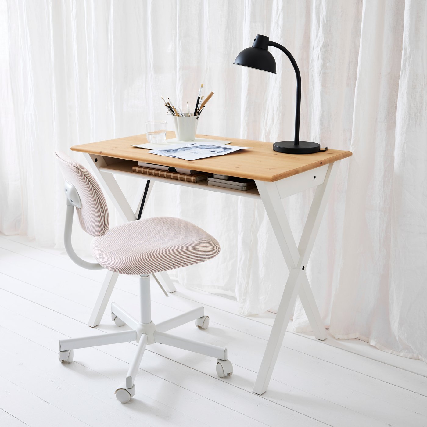 A pine/white BOLLPOJKE desk in the home office