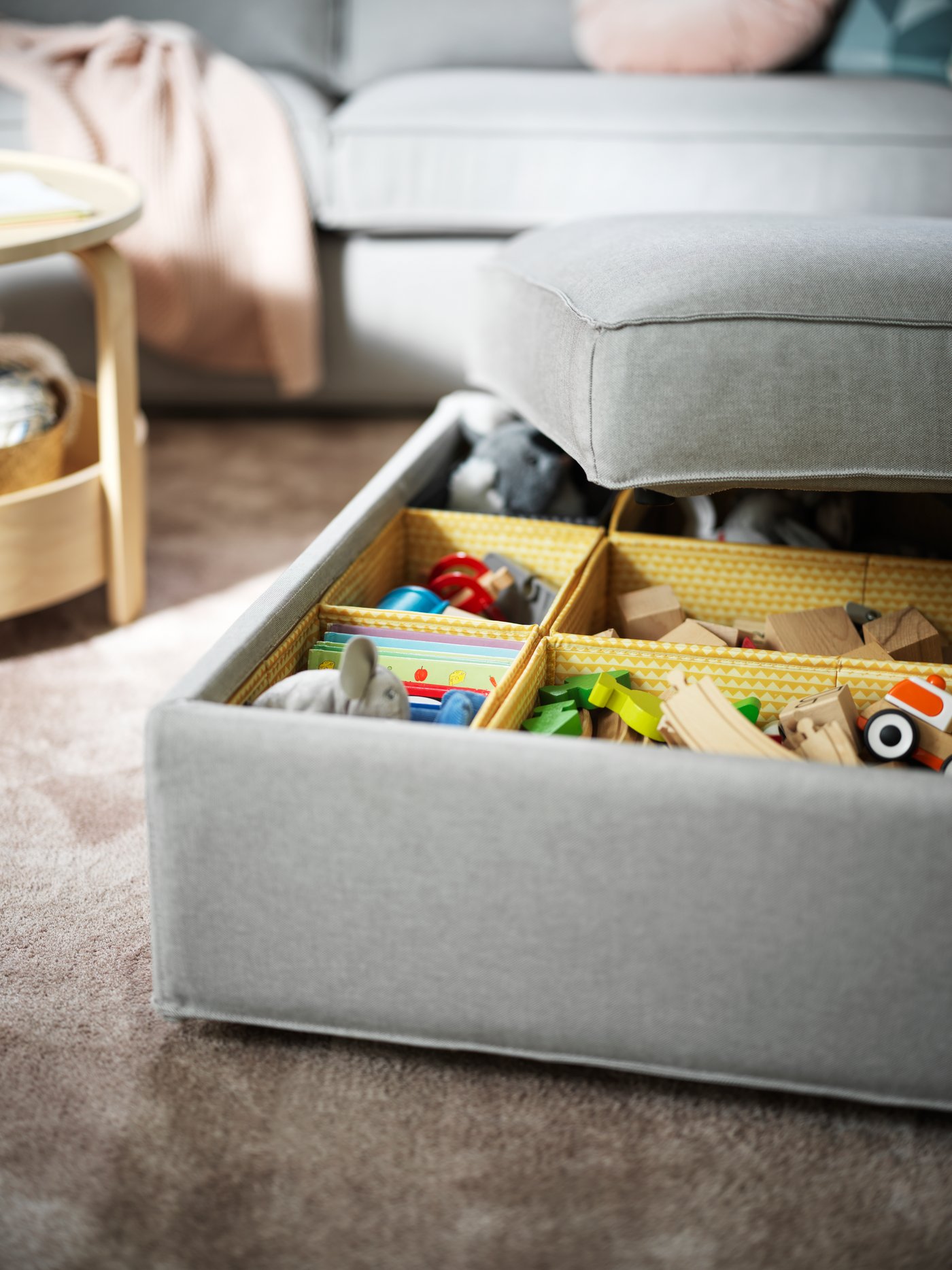 UPPRYMD boxes inside KIVIK footstool
