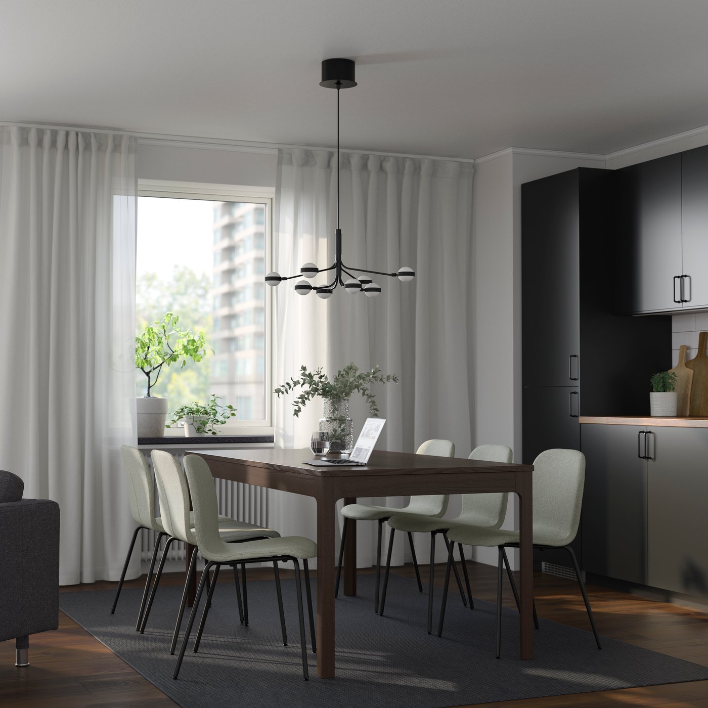 A dark brown/Gunnared light green black KARLPETTER table and 6 chairs