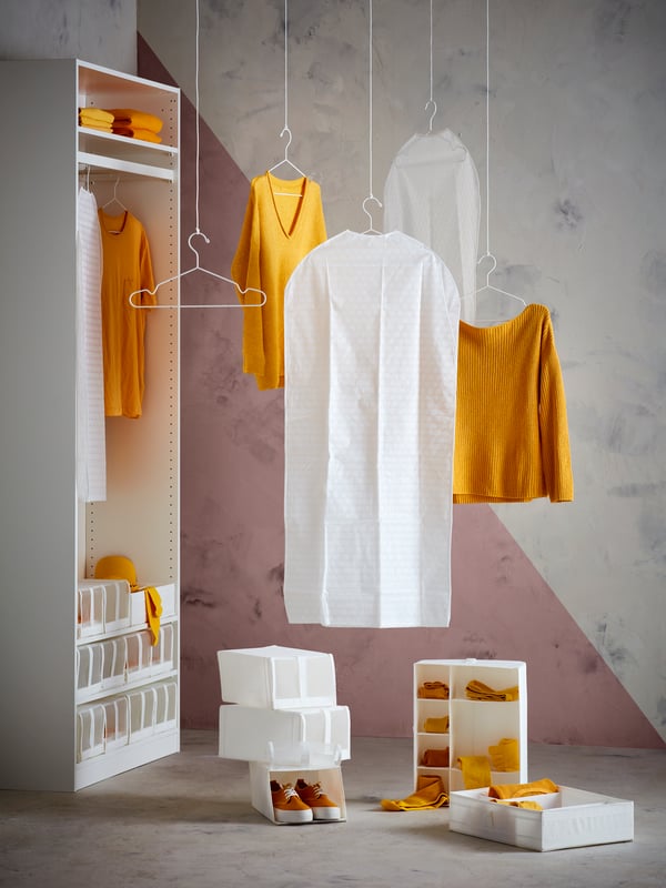 A white STAJLIG hanger, in/outdoor in the bedroom