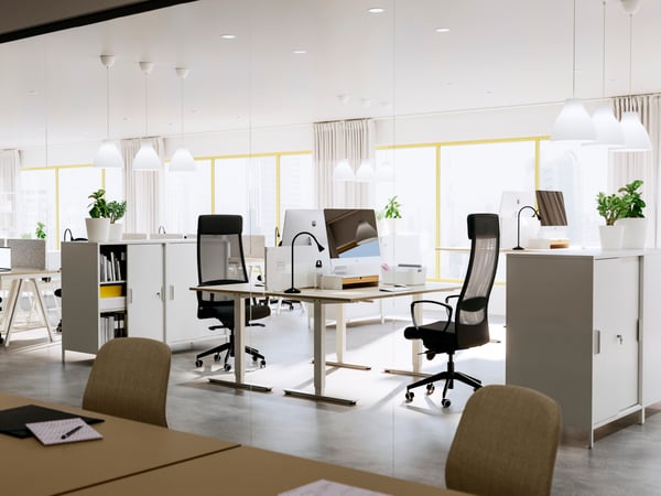 A white MELODI pendant lamp in the home office