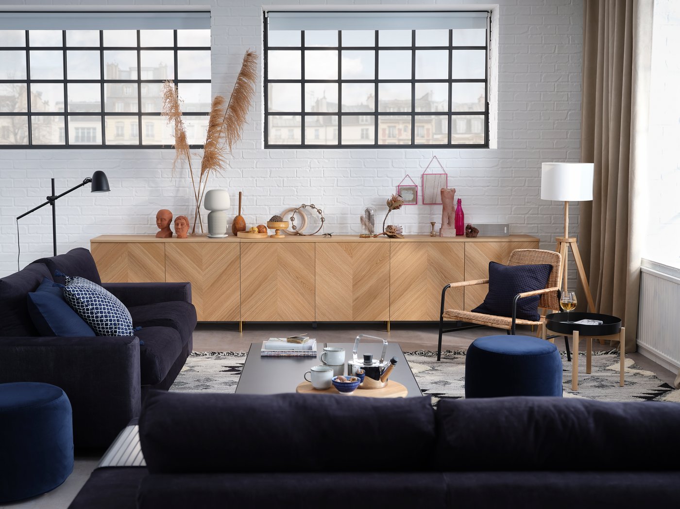 A BESTÅ TV bench and multimedia storage combination in a living room.