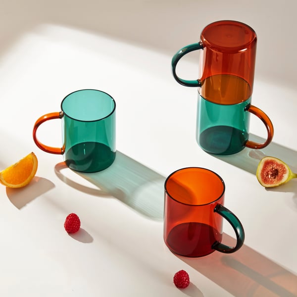 A mixed colours brown/green SKUGGSTUBB mug