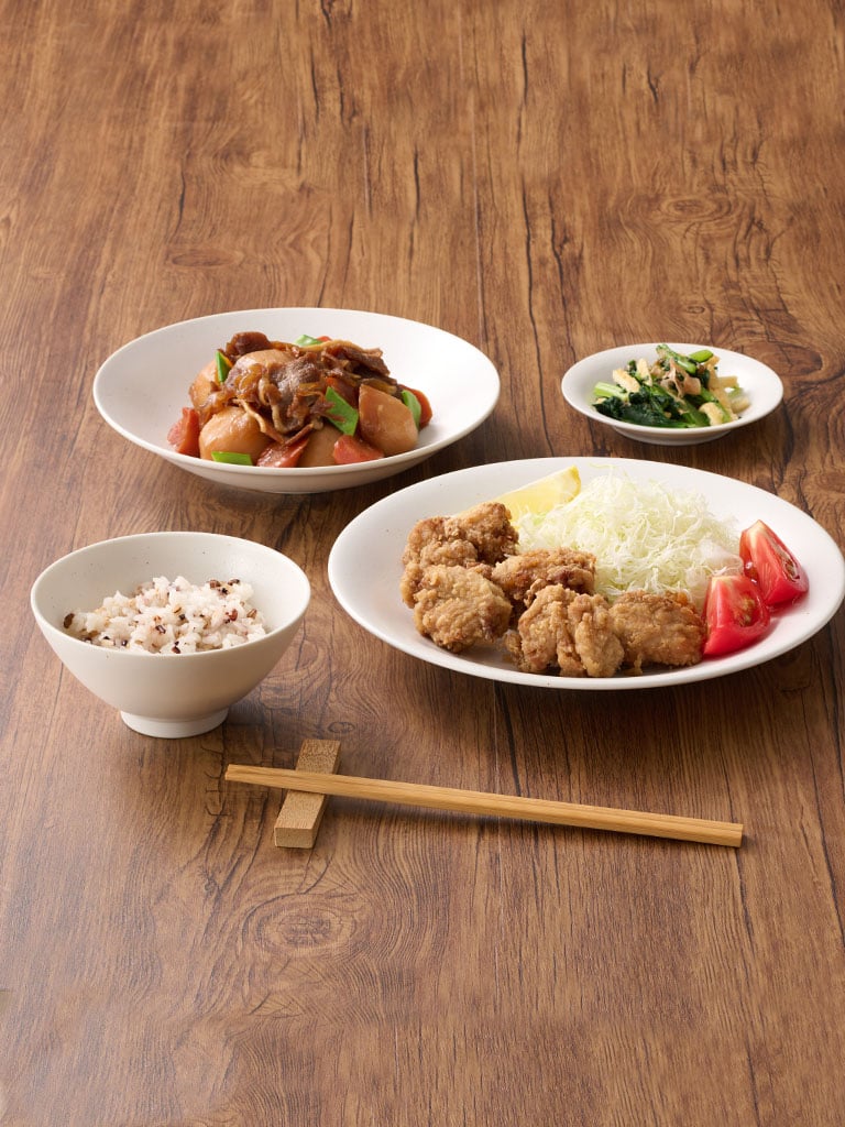 A white HARMYNTA side plate
