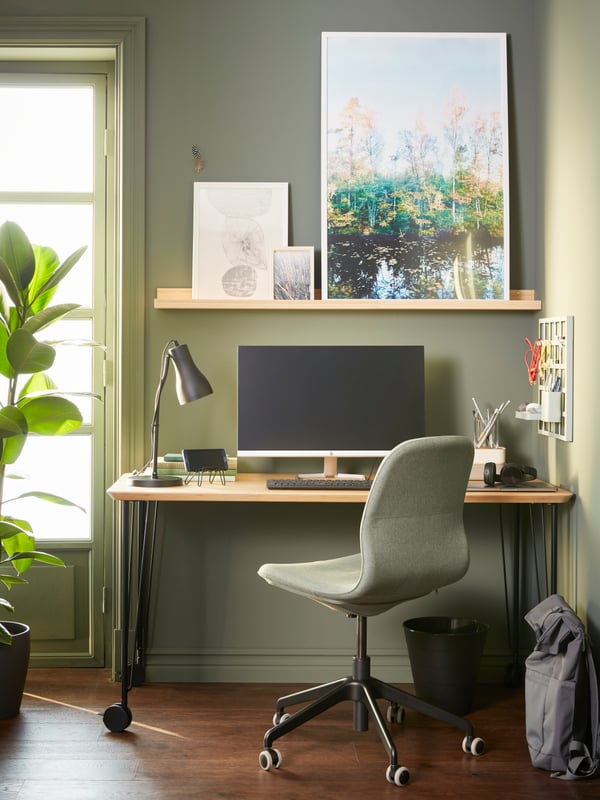 A grey-green SNICKRA 8-piece storage board set