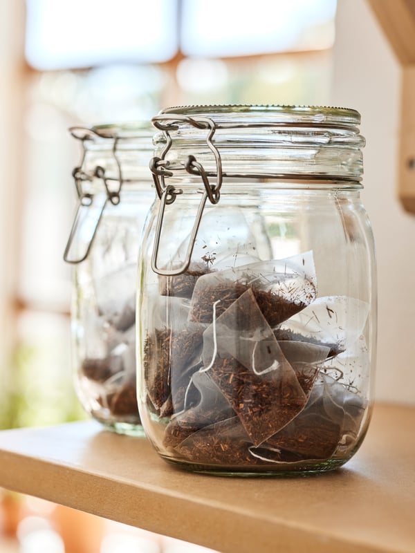 A clear glass KORKEN jar with lid