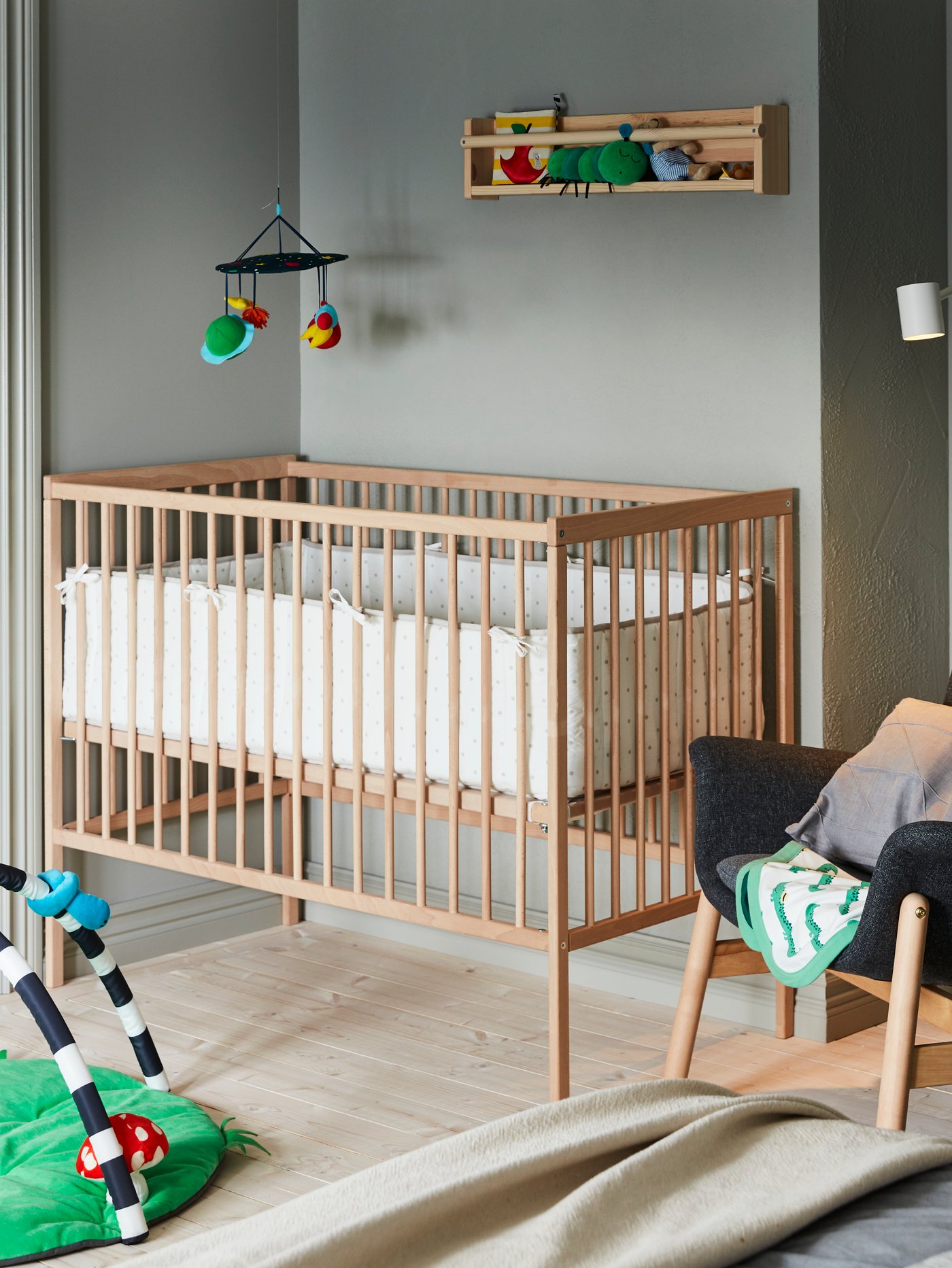 A light white stained pine FLISAT wall storage in the childrens room