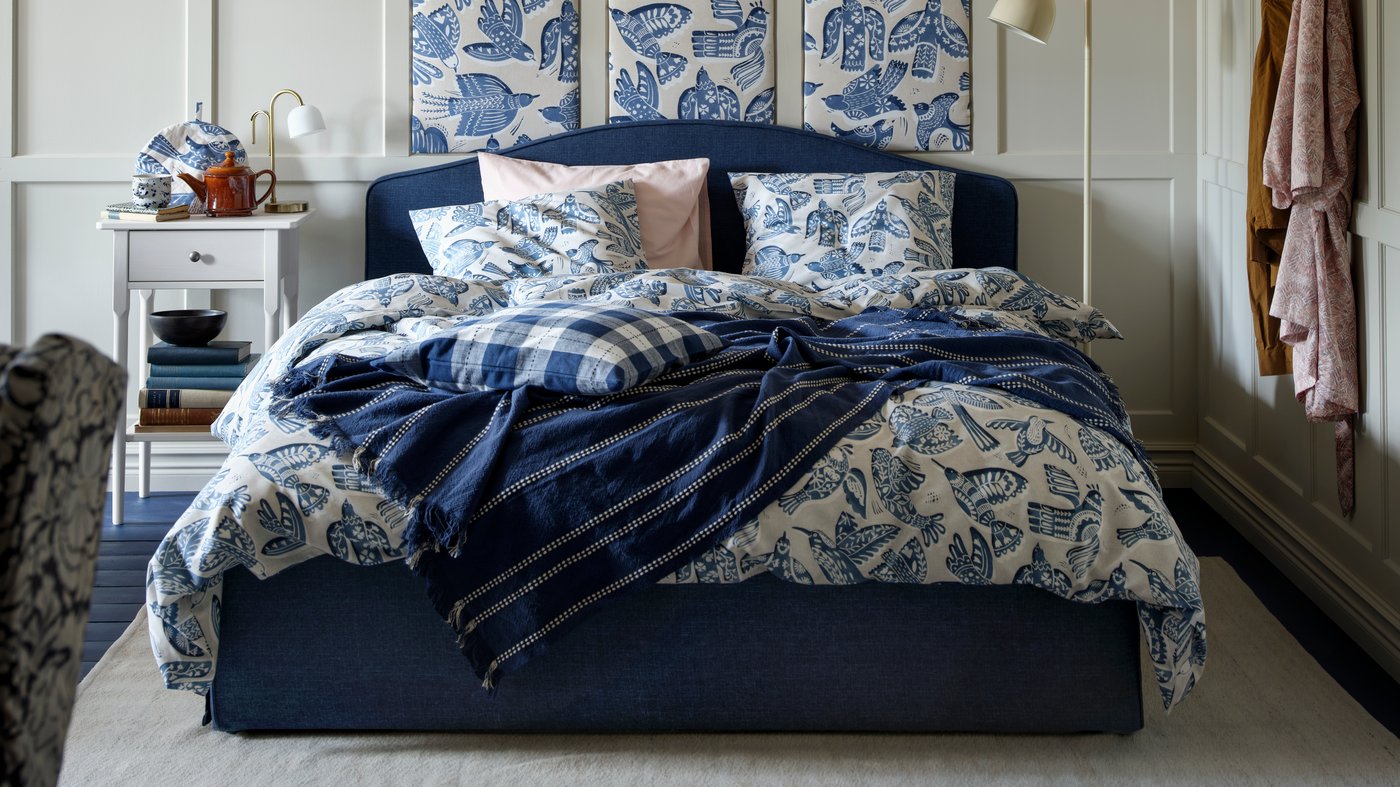 A beige/blue/bird pattern BITTERSÖTA pre-cut fabric in the bedroom