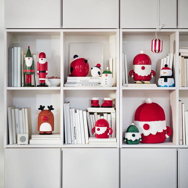 An IVAR shelving unit displaying VINTERFINT collectable ceramic decorations by designer Marta Krupińska.