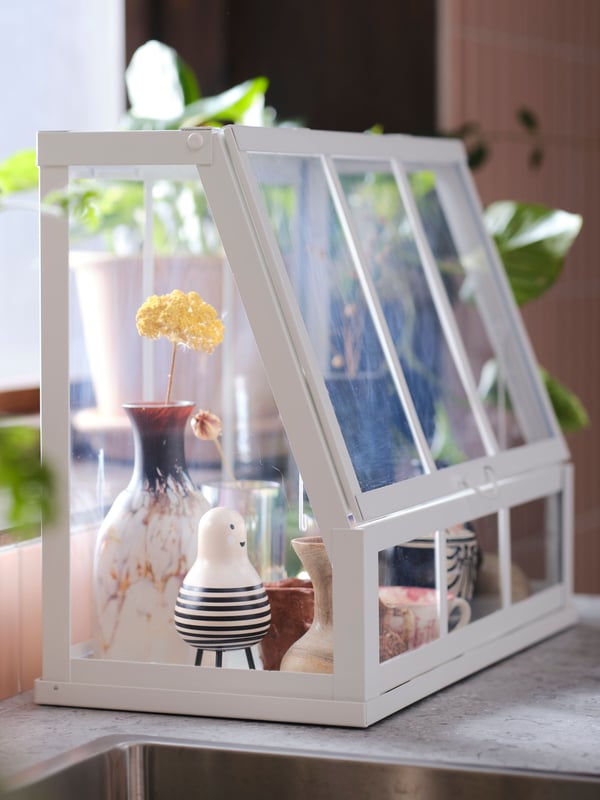 An in/outdoor/white ÅKERBÄR greenhouse