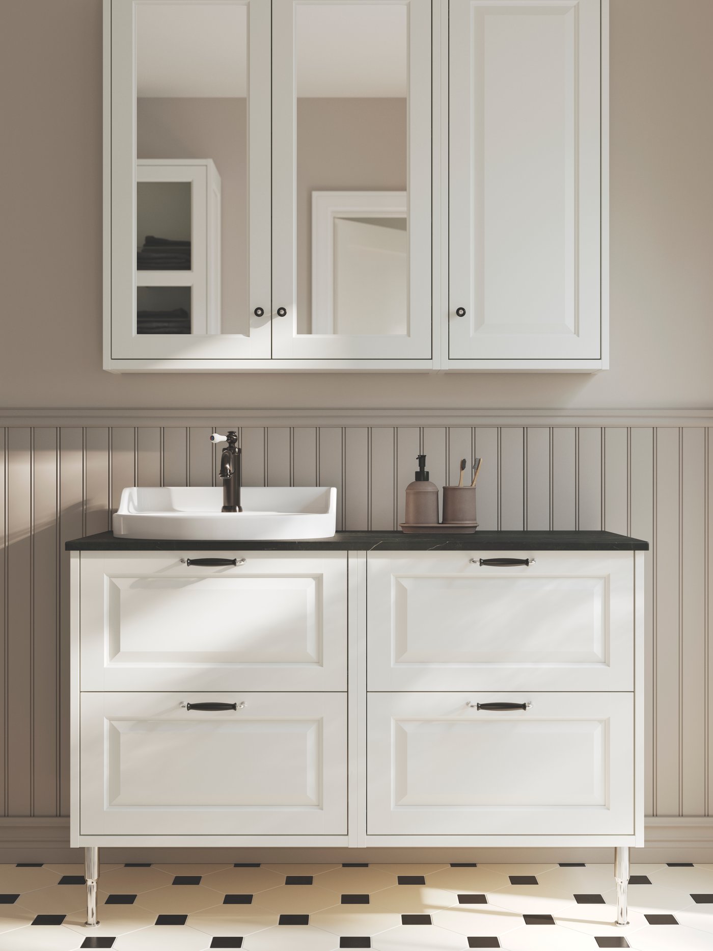 A light grey bathroom has two white TÄNNFORSEN wash-stands with a countertop in black marble effect and a mirror cabinet.