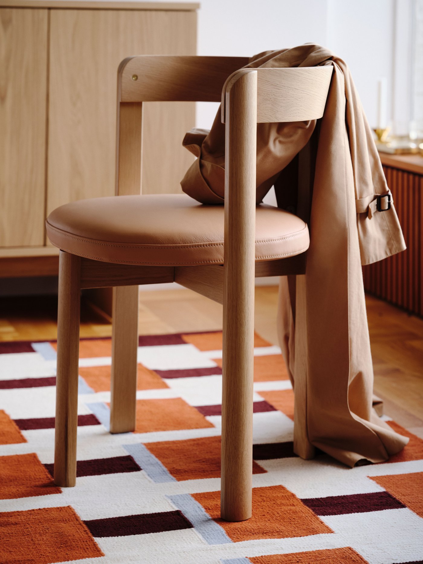 An oak veneer STOCKHOLM 2025 shelving unit/bench