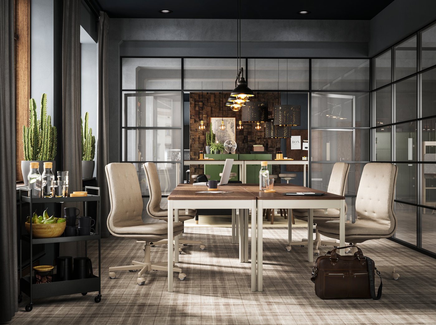 A black OTTAVA pendant lamp in the home office