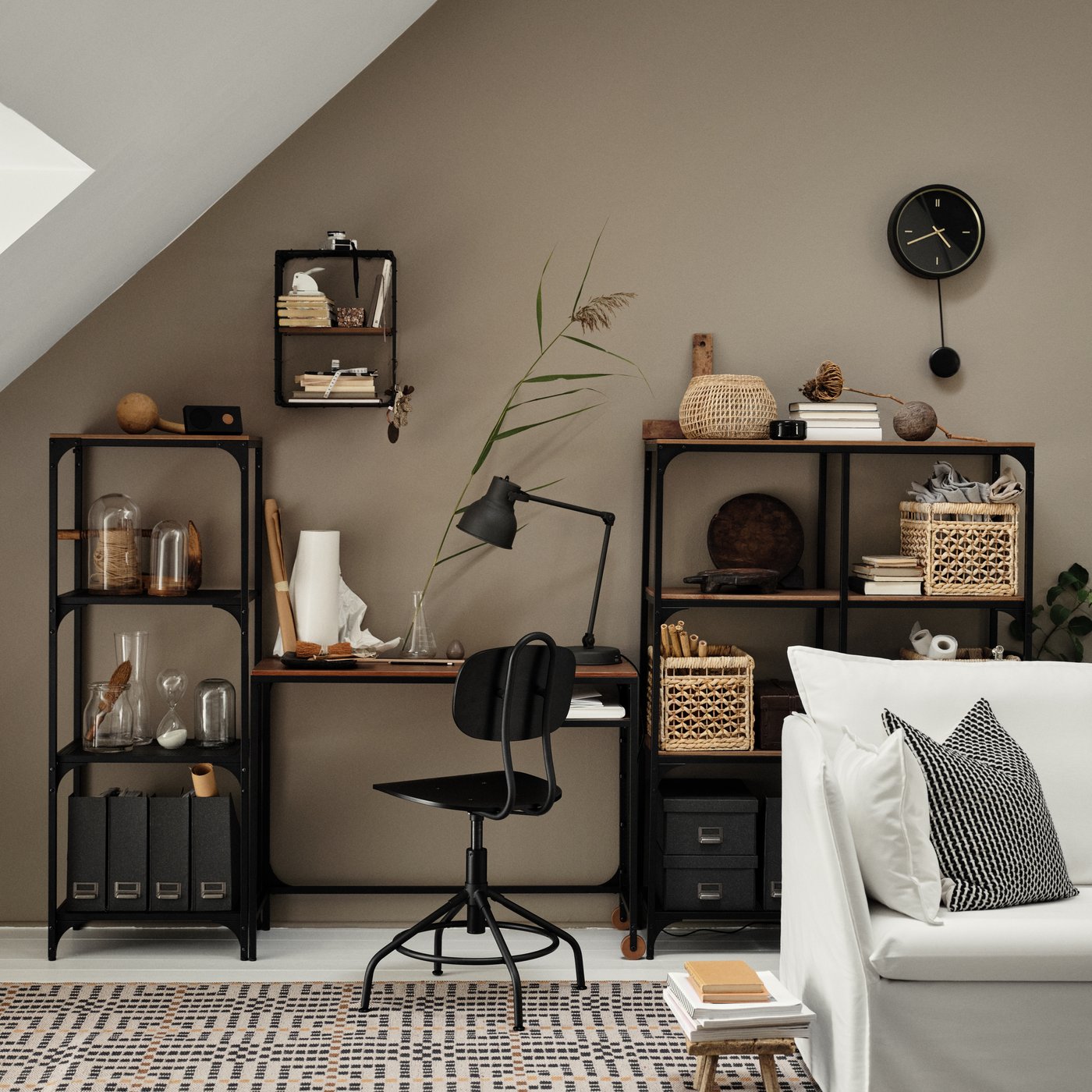 A black FJÄLLBO laptop table in the home office