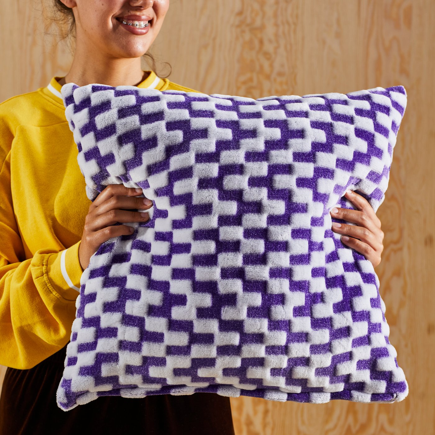 A purple/patterned BLÅSKATA cushion cover