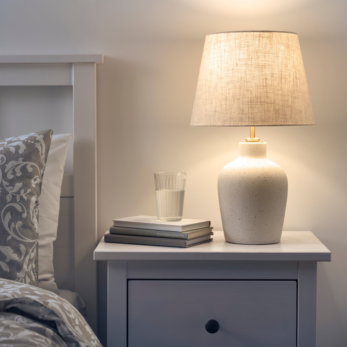 An off-white ceramic/beige BLIDVÄDER table lamp