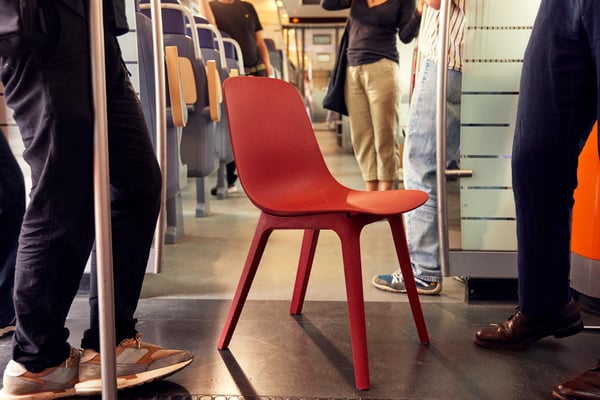 Red ODGER chair on the underground. 