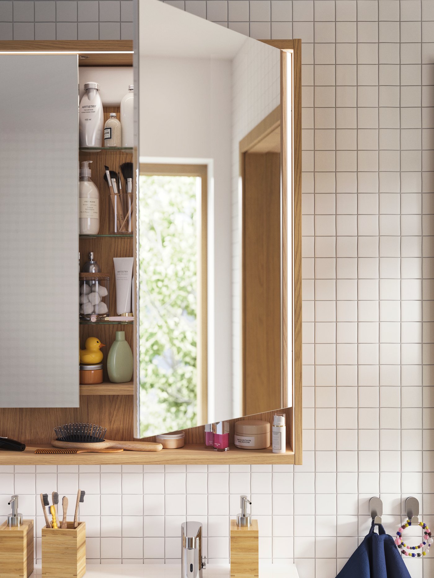 A chrome-plated BROGRUND wash-basin mixer tap with sensor in the bathroom