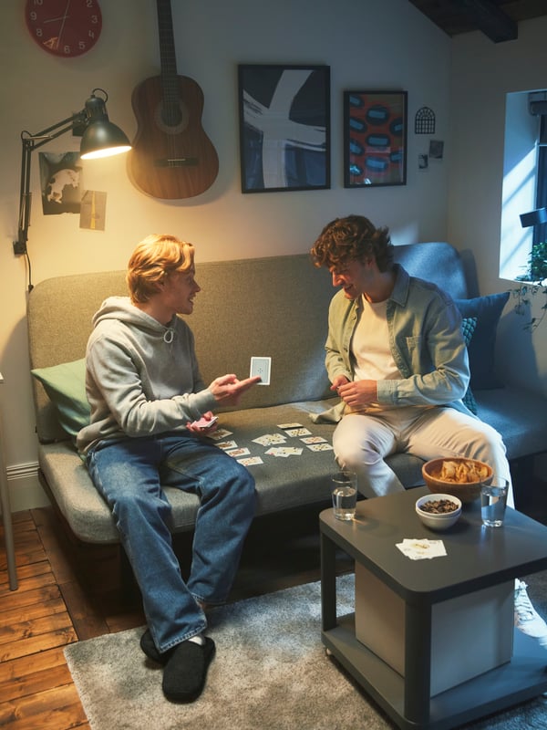 A grey TINGBY side table on castors