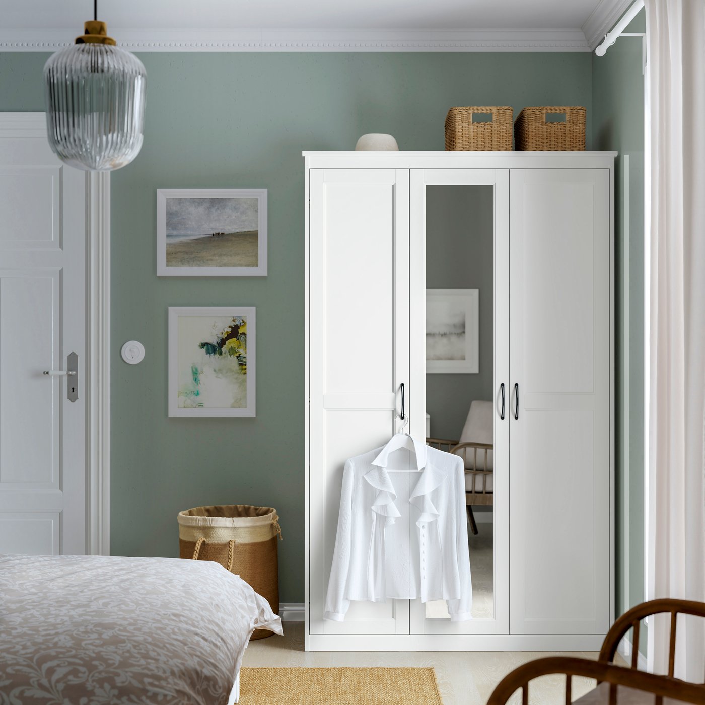 A white SONGESAND wardrobe