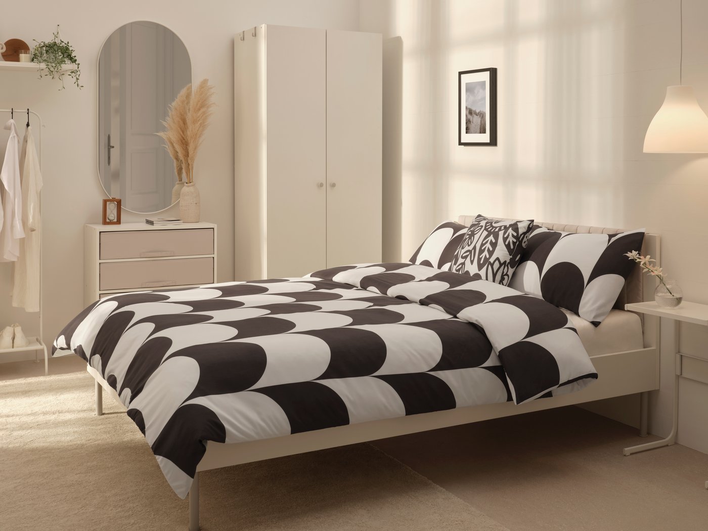 A white/light grey BRUKSVARA bedroom furniture