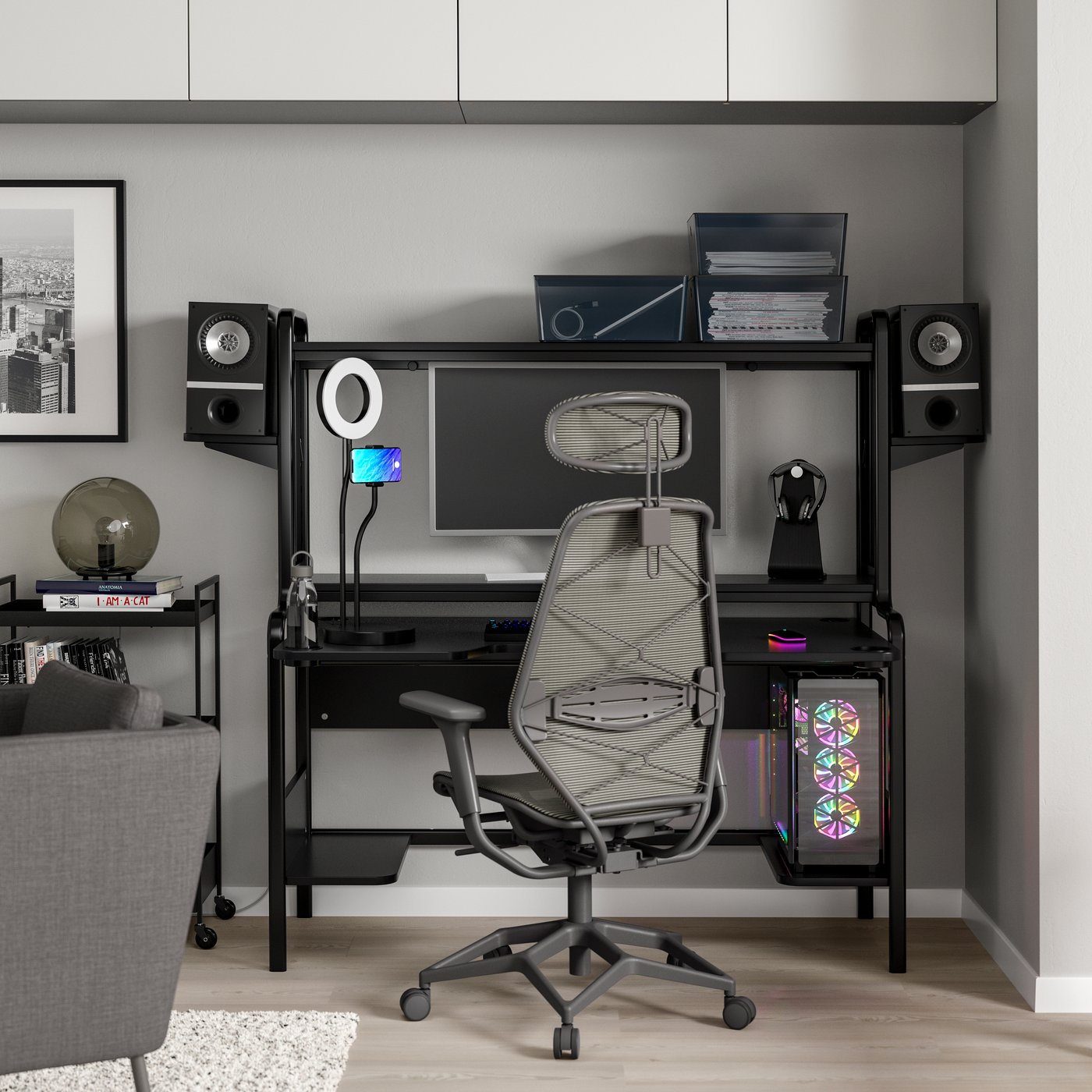 A black/grey STYRSPEL gaming desk and chair