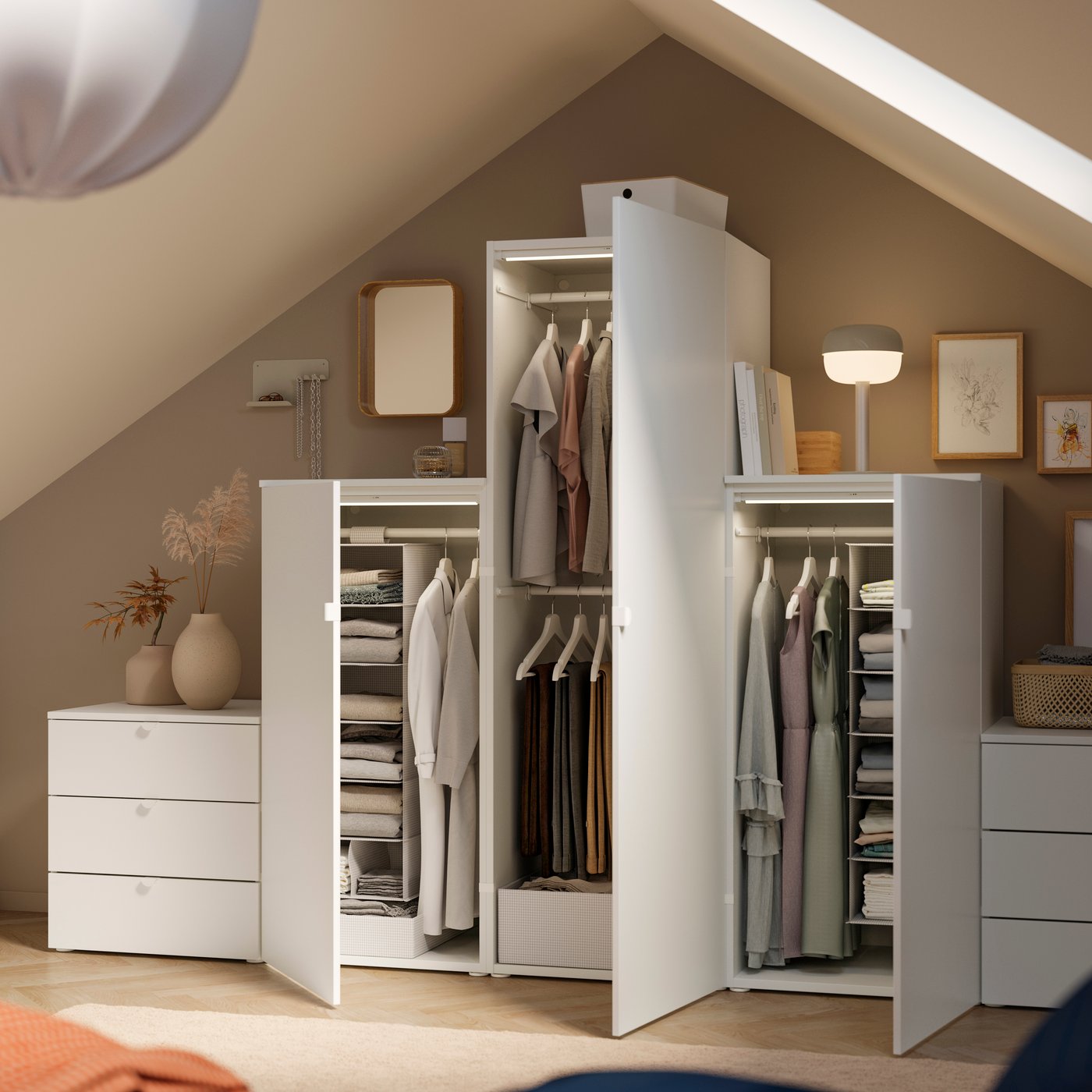 A white/Fonnes white PLATSA wardrobe with 3 doors+6 drawers in the bedroom