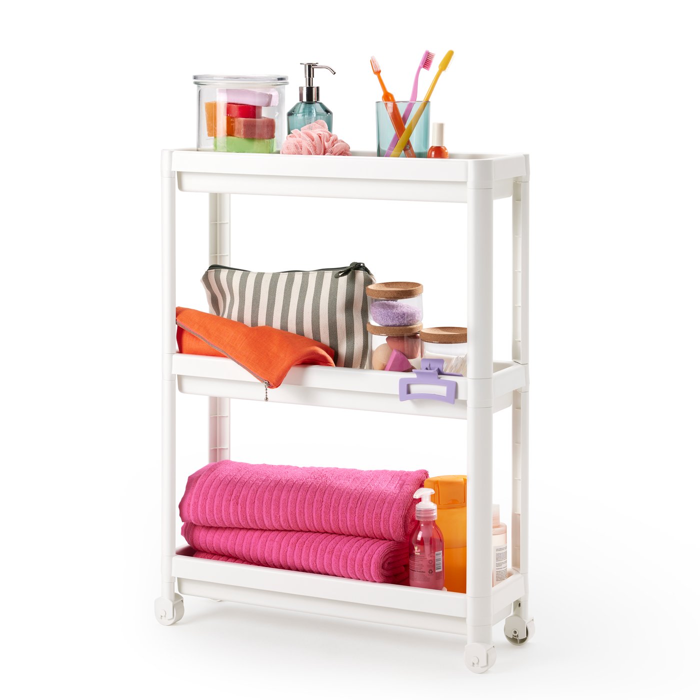A white VESKEN trolley with wheels is filled with bathroom items.