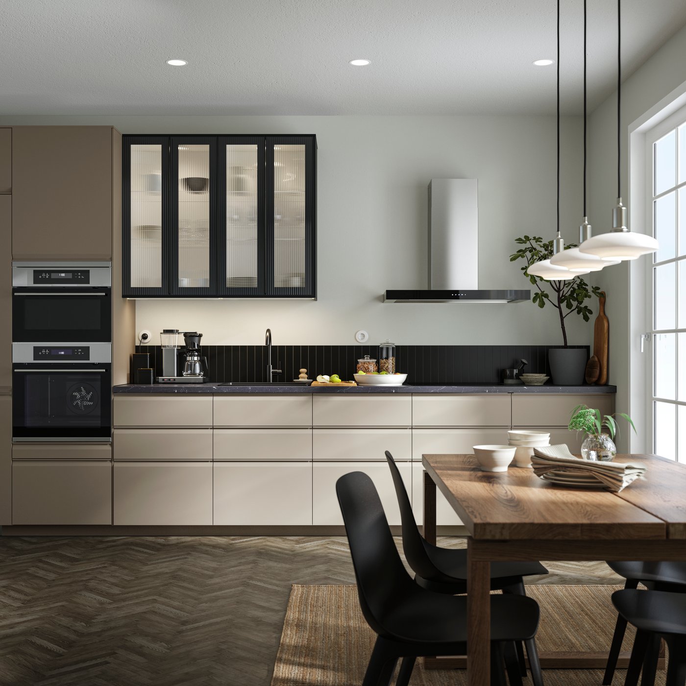 A dark grey PERSILLADE plant pot in the kitchen