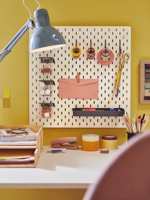 A light blue TERTIAL work lamp