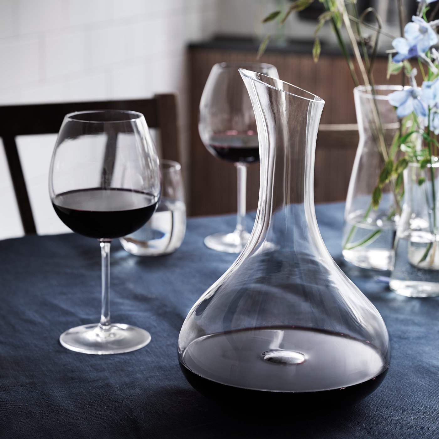 A clear glass STORSINT carafe in the dining room