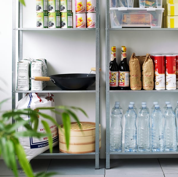 Two grey shelving units