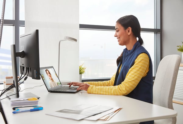 A IKEA staff member is having an online design consult with a client 