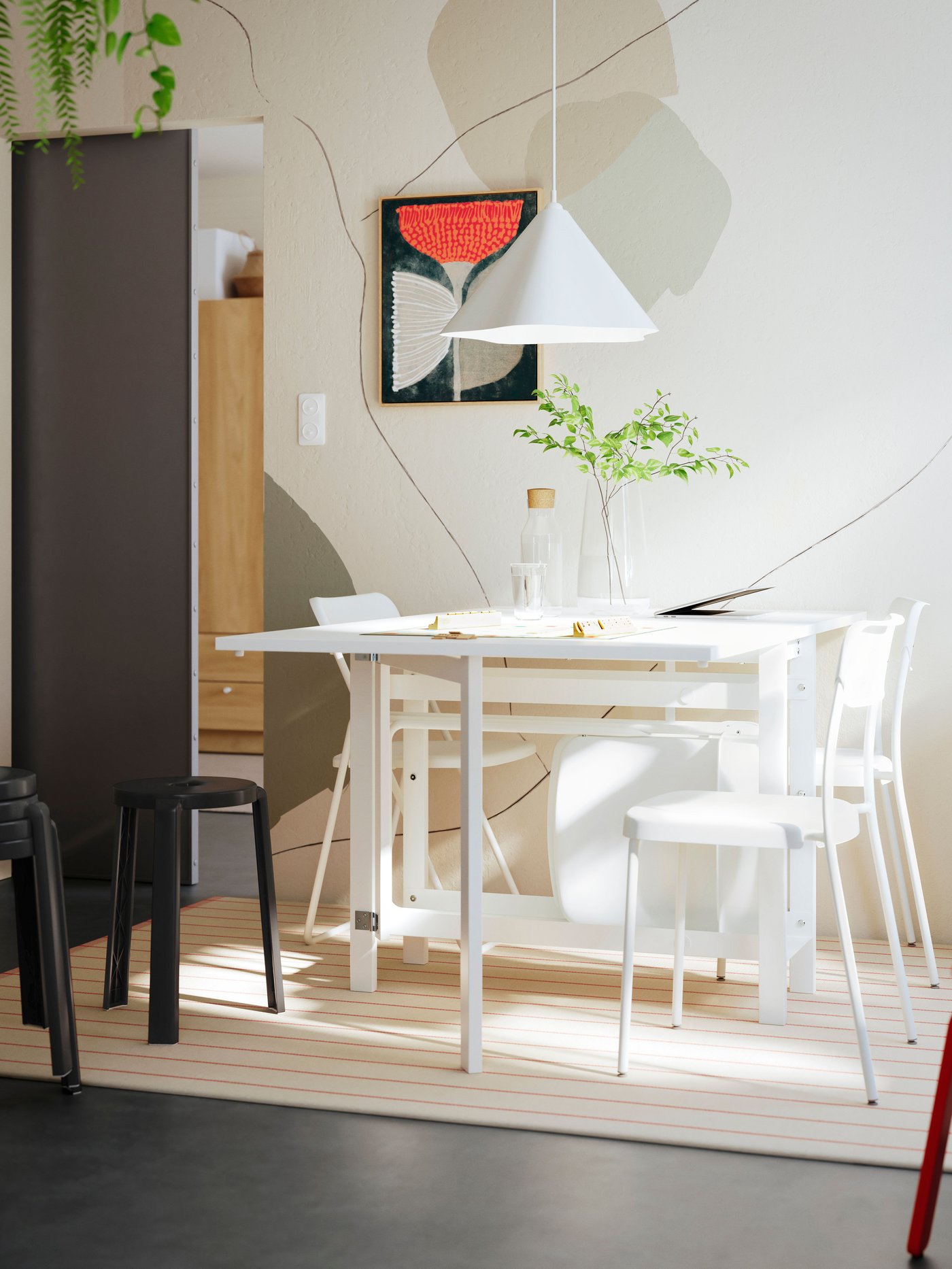 An orange flower BLODFLÄDER picture in the dining room